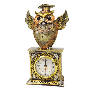 Часы Сова с крыльями вверх 10х19х5 см серебристо-золотая